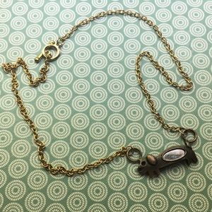 Mirrored wiener dog pendant on vintage gold tone